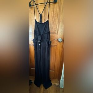 Free People lounge overalls with tie in the front. Color black in size XL.